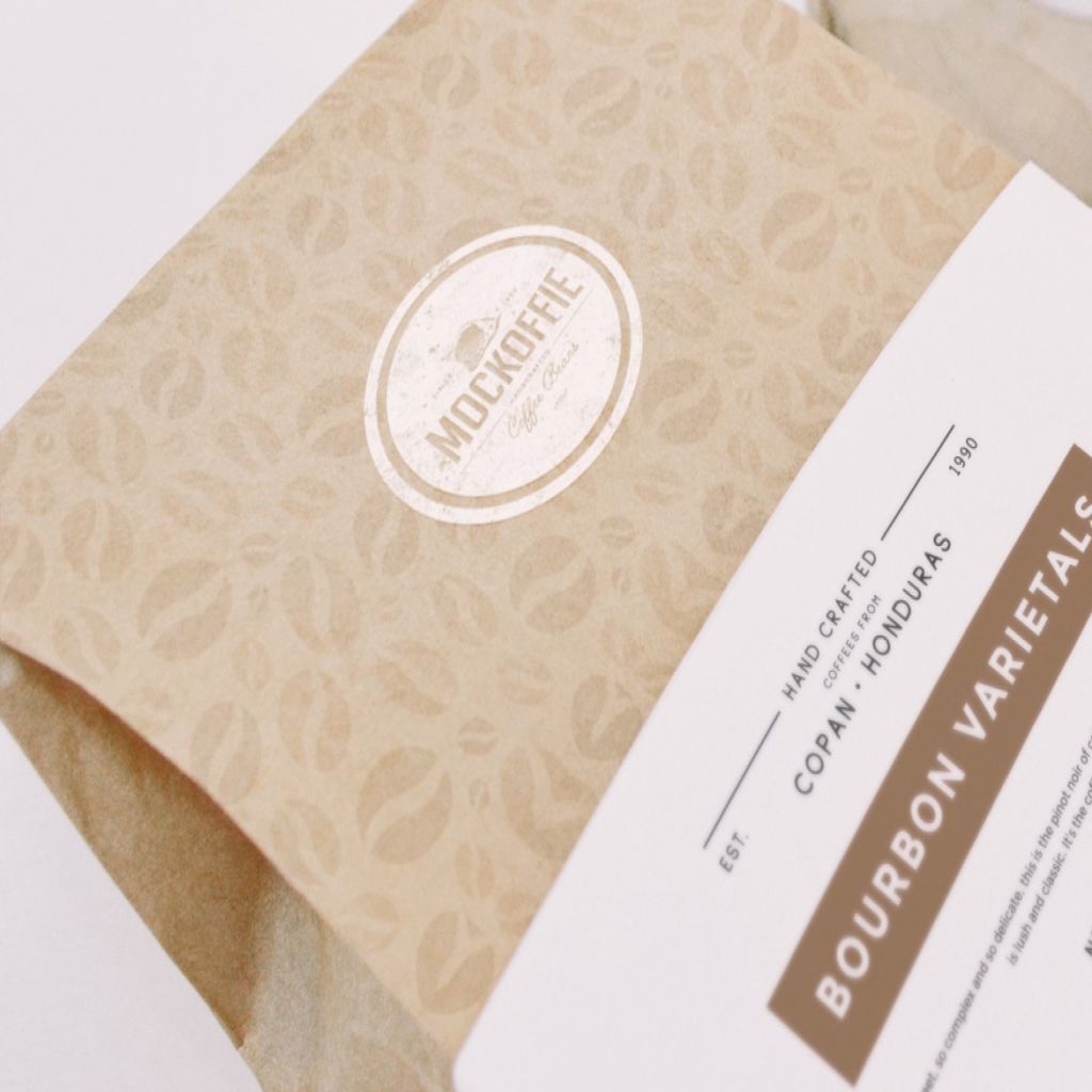 08-coffee-bag-and-cup-mockup-perspective-top-view-detail-1-1170x780